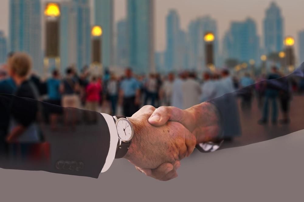 business handshake-0a8ec573b46947858384d6b32f3586a1.jpg business handshake